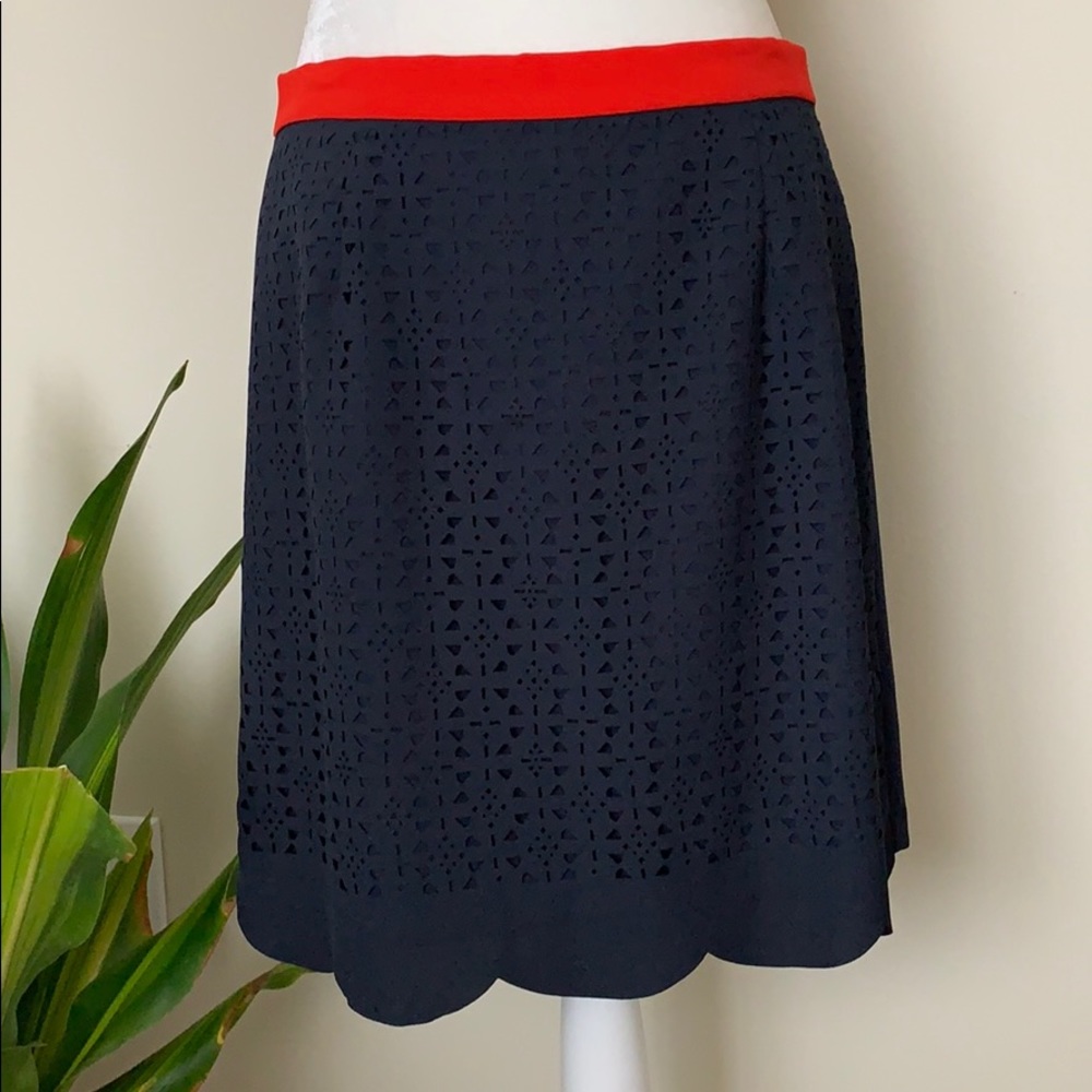 Pixley navy skirt with laser cut detail on front.